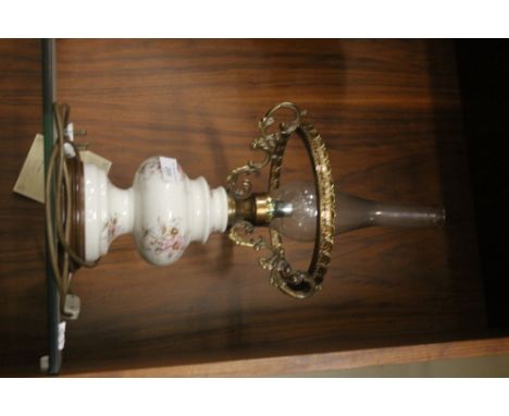 A REPRODUCTION STYLE ELECTRIC OIL LAMP