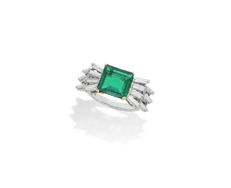 AN EMERALD AND DIAMOND RING, BY GARRARDThe step-cut emerald weighing 2.94 carats, between radiating baguette-cut diamond shou