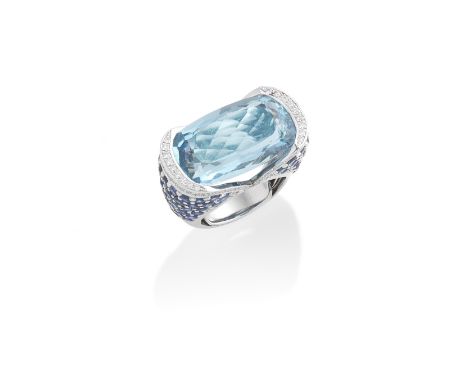 AN AQUAMARINE, SAPPHIRE AND DIAMOND RINGThe cushion-shaped aquamarine between raised shoulders pavé-set with brilliant-cut di