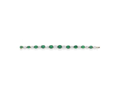 AN EMERALD AND DIAMOND BRACELET, BY BULGARISet with an alternating graduation of oval-cut emeralds and diamonds,  signed Bulg