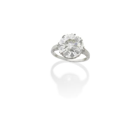 A DIAMOND SINGLE-STONE RINGSet with an old brilliant-cut diamond weighing 6.93 carats, with scrolling detail on the gallery a