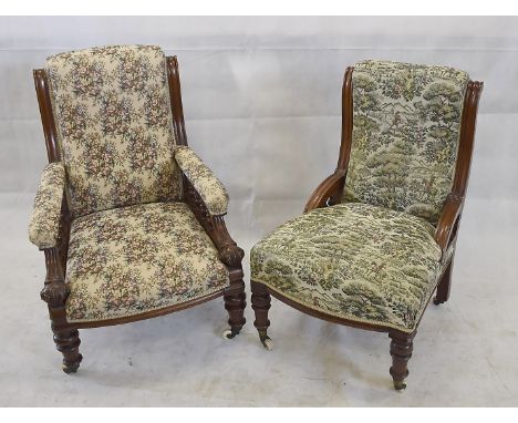 A matched pair of his and hers Victorian stained beech fireside chairs, with stuff over seats and ceramic castors 
