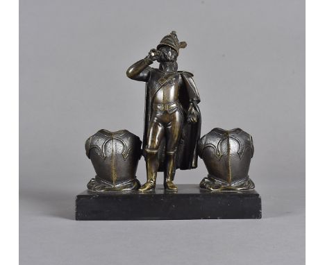 A Victorian figural table lighter, the central spelter gent standing in military dress smoking wick flanked by breast plate m