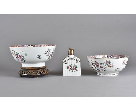 A 19th Century Chinese famille rose tea caddy, of reeded design with floral sprays, having later metal sifter to top, neck af