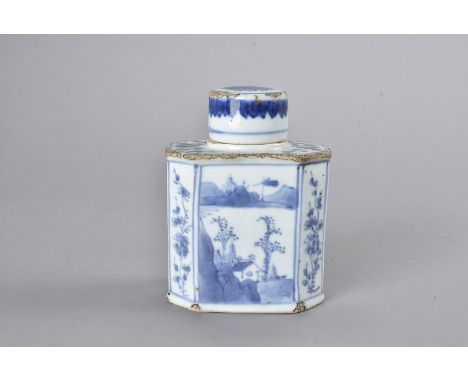 An 18th Century Chinese blue and white porcelain tea caddy, of octagonal shape, the two larger panels with landscape design f