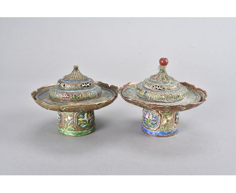 Two Chinese copper lotus leaf footed bowls and cover, both decorated with enamel, having floral design, with borders, some of