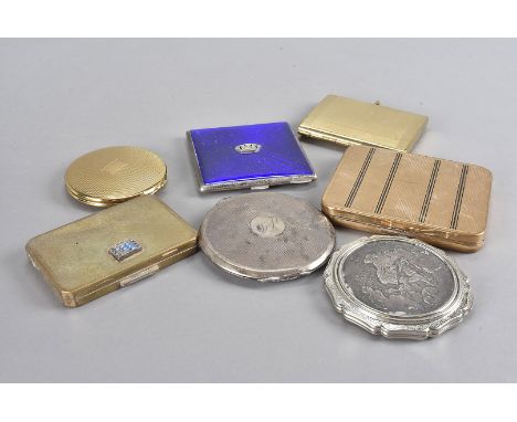 A 1939 silver compact, marked Birmingham, together with a selection of other compacts, including a white metal and enamel exa