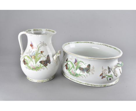 A first period Belleek stoneware washing set, comprising small circular bowl, large oval basin, large jug decorated with tran