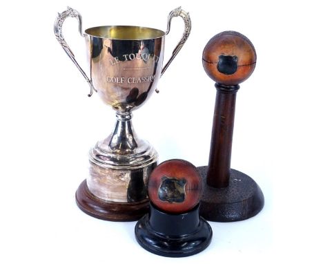 A collection of sporting memorabilia, to include a cricket ball mounted on a  pedestal, with plaque and engraved Presented by