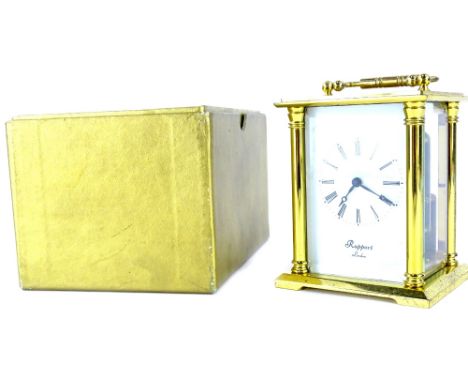 A Rapport brass carriage clock, the white enamel type dial with Roman numerals, in presentation box, 14cm high.