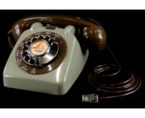 An unusual 1960's type 706 grey vintage telephone, with chrome dial, bell on/off switch.