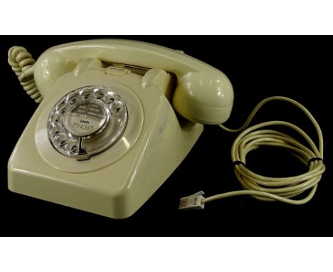 A 1960's GPO 706 ivory vintage telephone, with bell on/off switch.