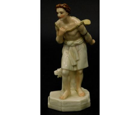 A Royal Worcester porcelain figure, modelled in the form of a gentleman carrying a grape hod beside a obelisk with lion mask,