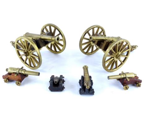 A collection of scale model and brass effect cannons, some on wooden trunnions etc. (6).