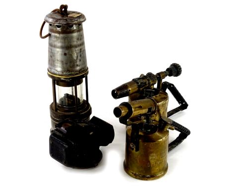 A collection of metalware, to include a Wolf Safety Company miner's lamp and two blow torches.