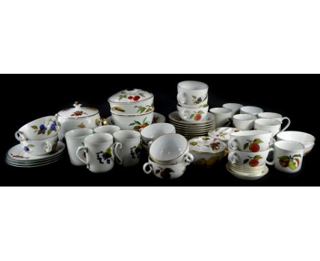 A quantity of Royal Worcester Evesham tea wares, etc., to include large cups, biscuit barrel, mugs, saucers, etc.