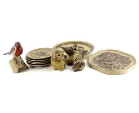 A collection of items of Poole Pottery, to include a plaque modelled by Barbara Linley-Adams, small plates, and four birds, t