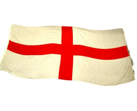 A large vintage naval ships flag, decorated with the cross of St George. 