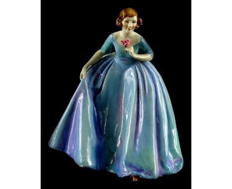 A Royal Worcester porcelain figurine The Duchess's Dress, modelled by Freda Doughty, the dress with a shaded purple, pink and