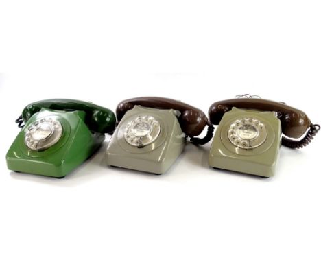 Three vintage telephones, in two tone beige and brown and green, each with inset for Portadown.
