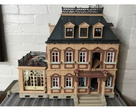 A Play Mobil Victorian mansion dolls house