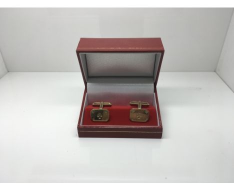 A pair of boxed 9ct gold cufflinks hallmarked 2000.