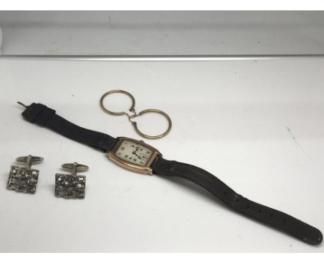 An Art Deco yellow metal watch, pair of 9ct gold hoop earrings and a pair of cufflinks