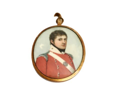 A finely painted, gilt framed portrait miniature locket of a 19th century soldier, containing a lock of hair to reverse,Appro