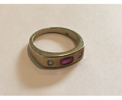 A Gents 14carat (585) Gold ring set with a ruby flanked by two diamonds weight 5g approximately