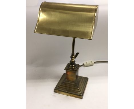 A brass desk lamp with stepped base, approx 44cm.