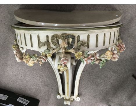 A marble top console table, approx height 78cm.