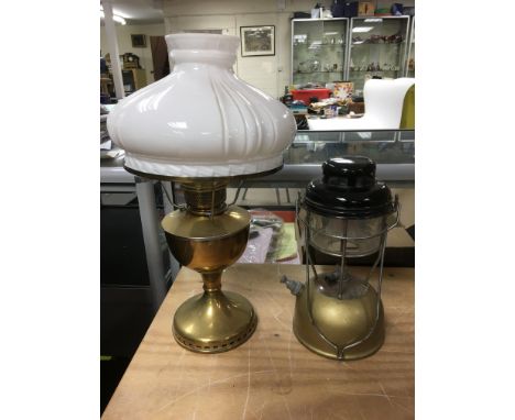 Two oil lamps, a copper churn, scales etc.