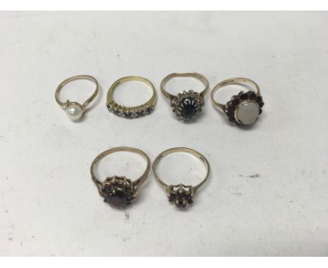 A collection of six 9ct gold rings. Sizes approx M, L & K. Total weight approx 14.1g