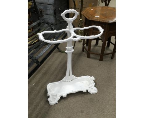 A white painted wrought iron stick stand, approx 72cm.