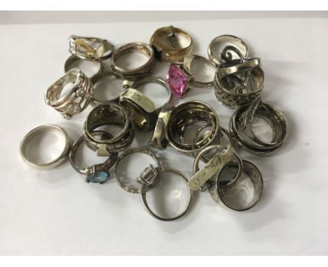 30 sterling silver assorted rings.