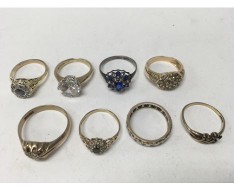 A collection of eight rings, 4x9ct, 1x14ct, 2 unmarked and 1 silver. Sizes approx T, K, I, M, L & P. Weight approx 21.4g