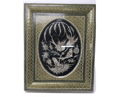 A Persian framed silvered tapestry. Size approx 26x32cm.