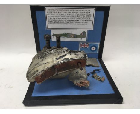 A collection of pieces recovered from a Rolls Royce Merlin engine originally part of a Hawker Hurricane L1998.