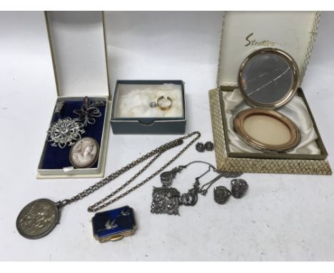 A collection of maquasite and silver jewellery including a compact and pill box.