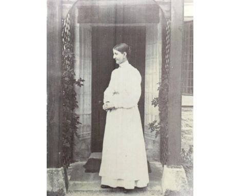 A Edwardian Governess Uniform comprising of a long grey skirt, matching blouse with stand up collar, long wide sleeves, blank