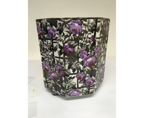 A Wilkinson Royal Staffordshire pottery jardiniere of hexagonal shape decorated with flowers.