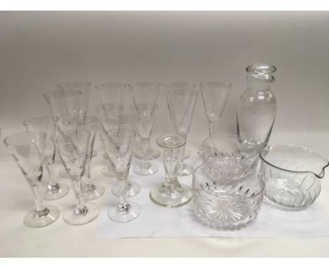 A collection of wine glasses, wine rinser glasses, decanter etc.