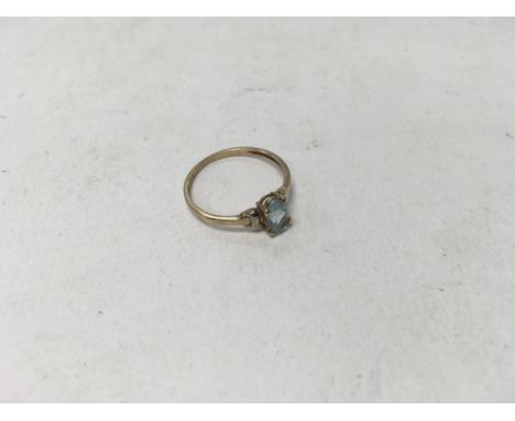 A 9ct gold topaz ring. Weight approx 0.9g, size approx K.