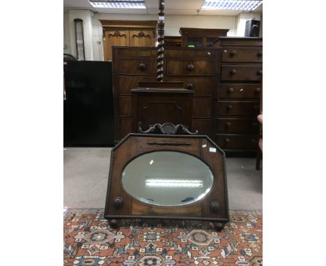 A collection of furniture comprising a mahogany pot cubbard ,oak barley twist standard lamp and a oak framed mirror