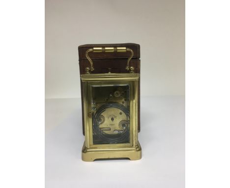 A cased brass carriage clock for repairs with repeat button