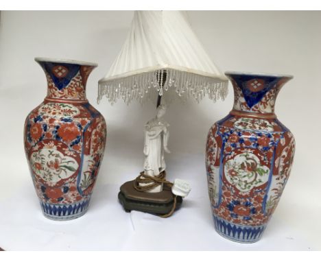 A pair of late 19th Century Imari vases, and a lamp surmount with a Chinese porcelain Blanc De Chine figure of the goddess Gu