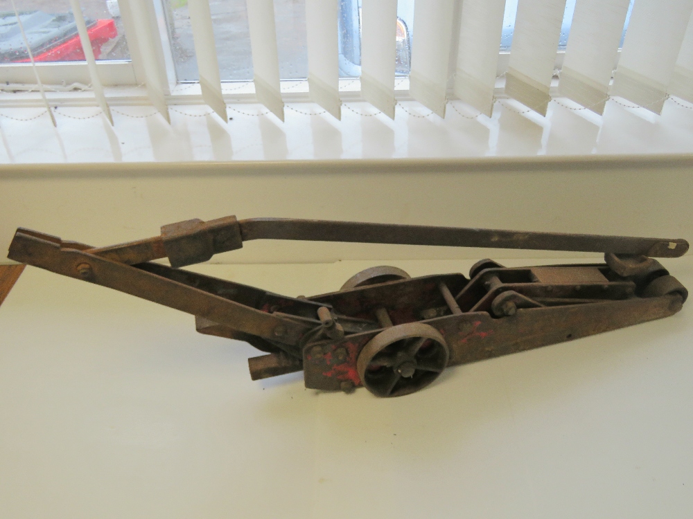 A vintage heavy duty automotive trolley jack c1920s, together with a