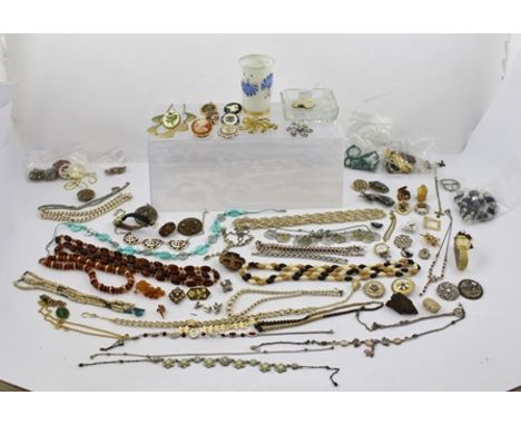 A QUANTITY OF COSTUME JEWELLERY; including a silver buckle, stone and seed pearl set four lobed pendant stamped 9c on gold ch