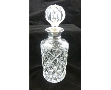 A LEAD CRYSTAL CUT GLASS DECANTER with silver collar and cut glass stopper, Birmingham 1974 