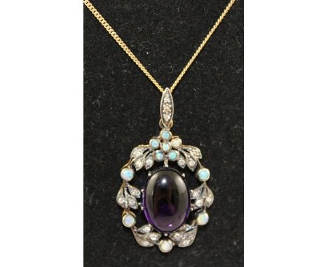 A VICTORIAN STYLE AMETHYST OPAL AND DIAMOND PENDANT, having central oval amethyst cabochon bordered by a wreath with multiple